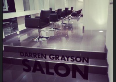 darren grayson salon with salon chairs and mirrors